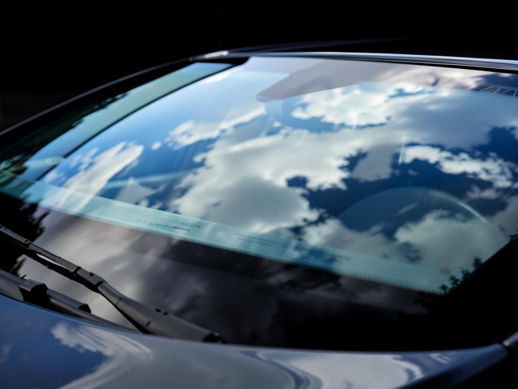 Flawless new windshield gleaming on a luxury vehicle
